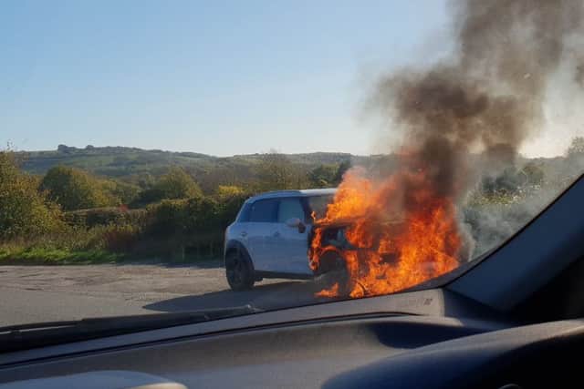 The car on fire. Photo by Susanne Denker