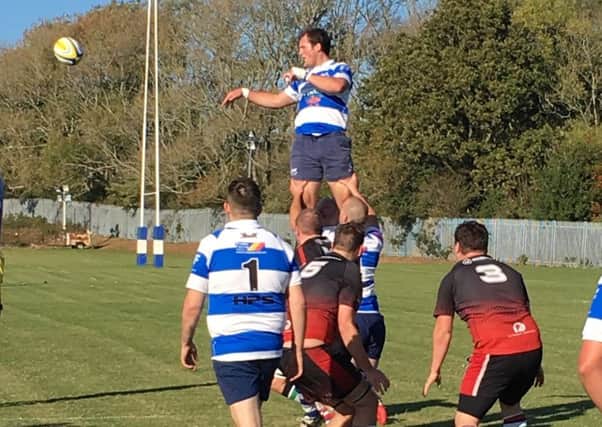 Frazer McManus claims the ball at a lineout during Hastings & Bexhill Rugby Club's narrow defeat at home to Vigo. Picture courtesy Gary Simpson
