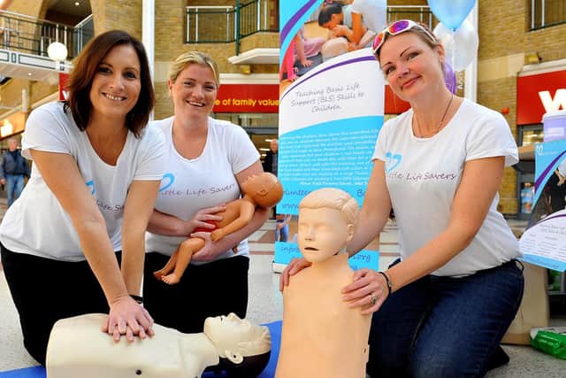 Claire Huggett, Tina Fox and Barbara Stanley from Little Life Savers, at the Market Place Shopping Centre in Burgess Hill. Picture: Steve Robards