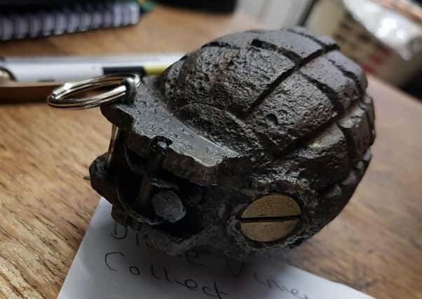 Sussex Police were called after a hand grenade was found in a bag of donated items given to the Mind charity shop in Goring Road, Worthing. Picture: Sussex Police uB5Iw_JaaHA4riR9KwjW