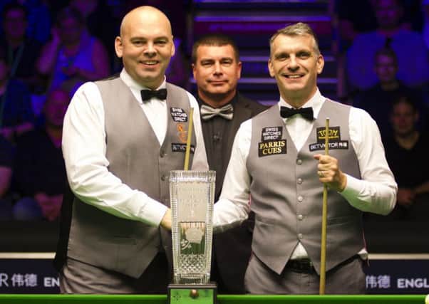Mark Davis (right) shakes hands with opponent Stuart Bingham prior to the English Open final at K2 Crawley on Sunday. Picture courtesy World Snooker