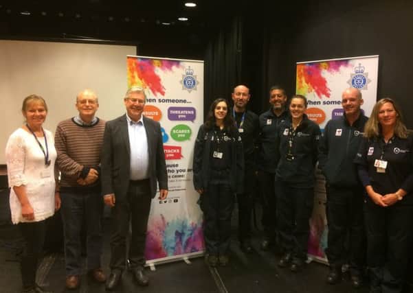 Horsham District Council's Neighbourhodd Wardens with Sgt Allan and other attendees SUS-181024-111057001