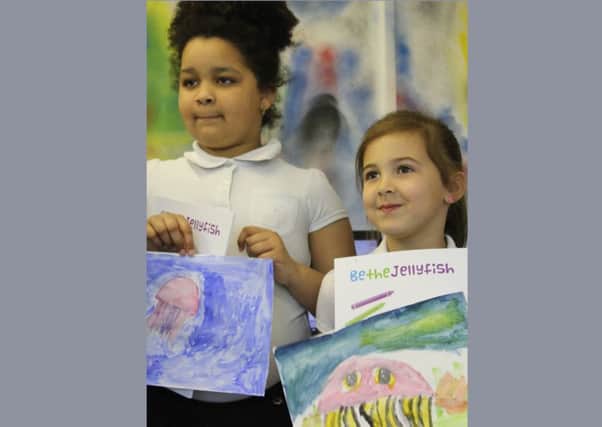 The Mill pupils with their artwork
