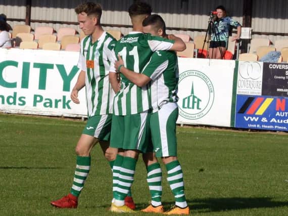 City players celebrate a goal in the recent 7-0 win over Lingfield / Picture by Kate Shemilt