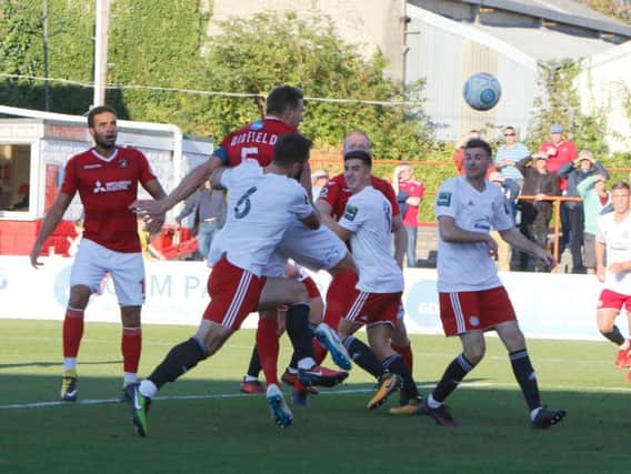 Action from Worthing's FA Cup clash at Ebbsfleet United. Picture by KM Group