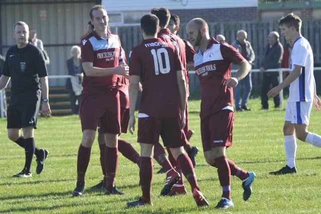 Little Common celebrate one of their first half goals against Hassocks