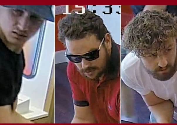 Police would like to speak to these men in connection with a theft from the Vodafone store in Horsham