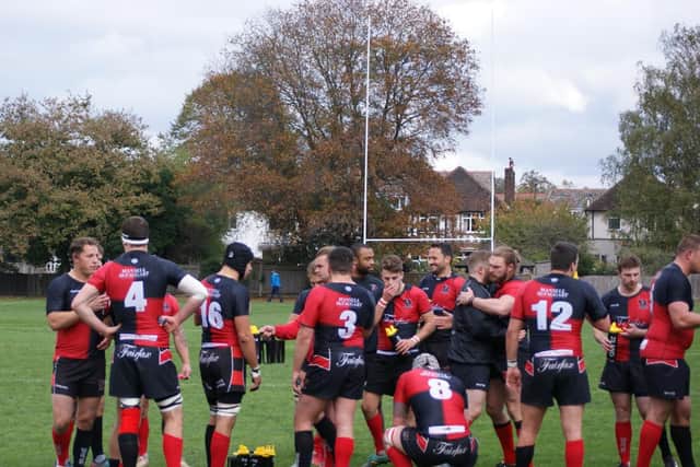 Heath celebrate a memorable win against Old Colfeians after conceding an early try