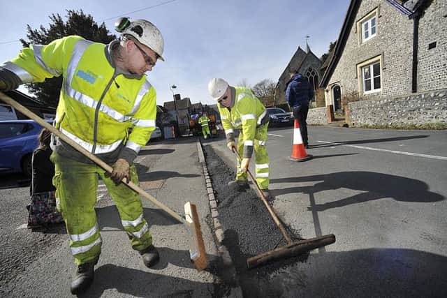 Teams from East Sussex Highways fixing a pothole in Church St. Willingdon, photo by Mark Dimmock