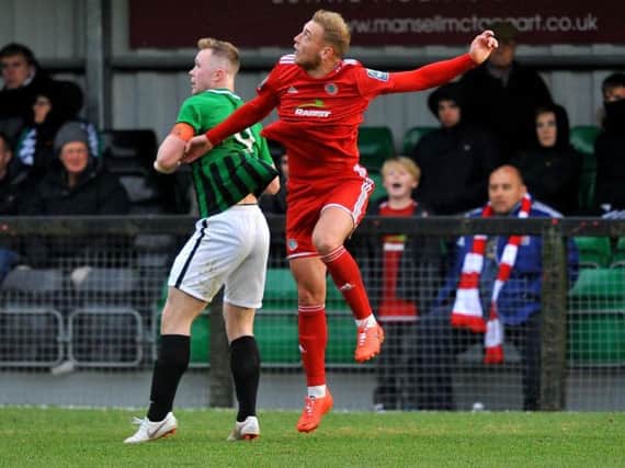 Action from Worthing's FA Trophy tie at Burgess Hill. Picture by Steve Robards