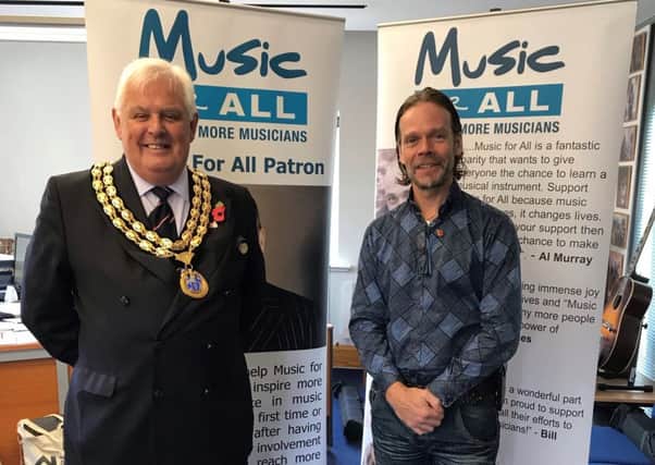 Music for All's Paul McManus with HDC Chairman Peter Burgess SUS-181120-105644001