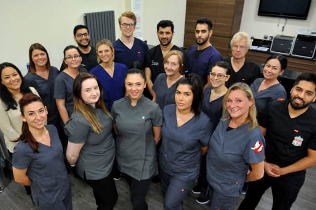 Sami Butt with his team at S3 Dental in Haywards Heath. Photo by Steve Robards