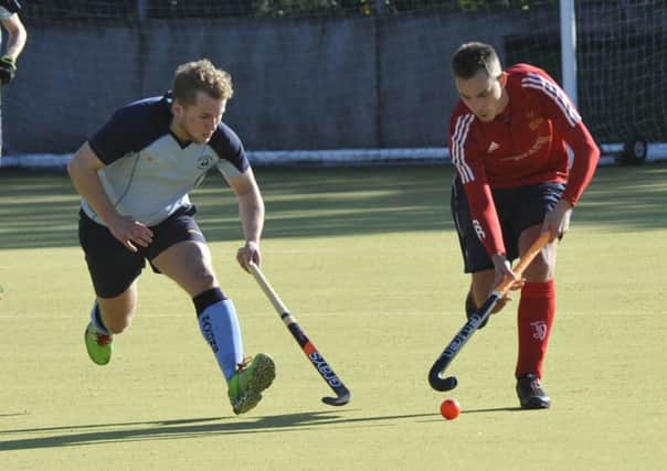 Will Orr pressurises a Mid Sussex opponent during South Saxons' 9-1 victory. Pictures by Simon Newstead