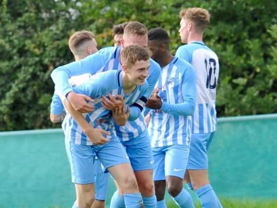 Worthing United celebrate a goal earlier in the season. Picture by Stephen Goodger