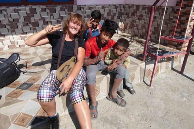 Tracey Shaughnessy meeting some of the Indian children