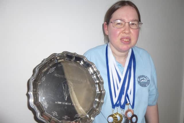Kirsty Stewart with her six medals and the female achievement shield at the Sussex Squids Gala in Bognor earlier this year