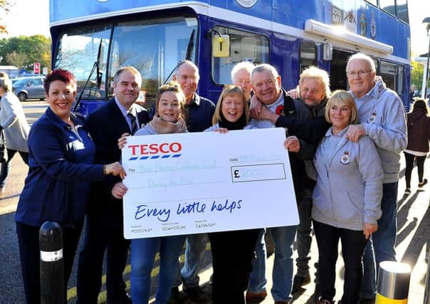 Tesco Extra Gatwick at Horley donate Â£ 2000 to the Danny Gallivan Trust. Pic Steve Robards SR1828842 SUS-181029-143123001