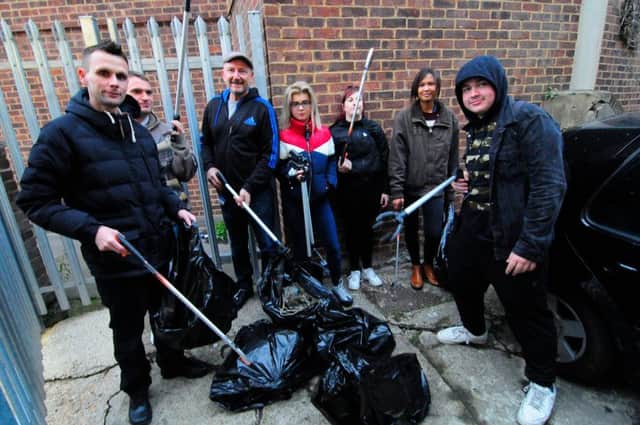 Young people from Xtrax gave up their free time to help clear up an alleyway in Hastings town centre SUS-180211-101003001