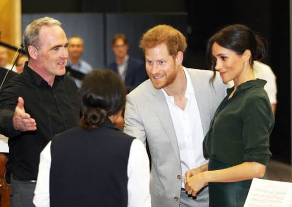 DM18100272a.jpg. Harry and Meghan, the Duke and Duchess of Sussex, open the University of Chichester's Tech Park. Photo by Derek Martin Photography SUS-180310-150100008