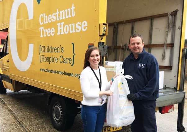 Managing director Danielle Plowman providing donations to Chestnut Tree House