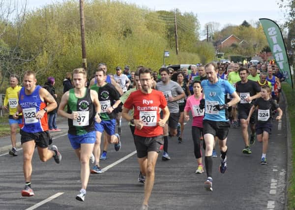 Runners set off at the start of the 2018 Beckley 10K, including race winner Jeff Pyrah (red vest). Pictures by Simon Newstead