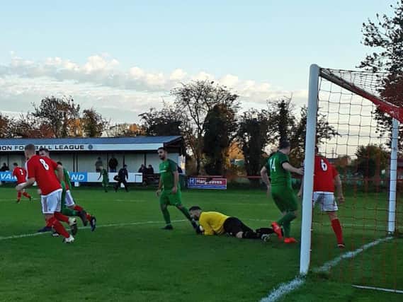 Action from Mile Oak's (in green) 2-0 away defeat on Saturday to Wick in the Division One Cup. Picture by Karen Hilton.