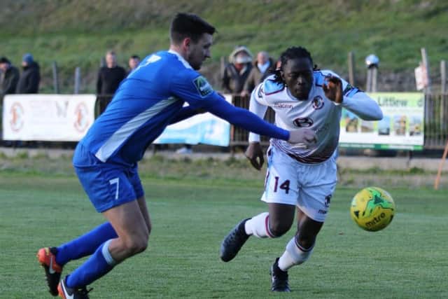 Two-goal Youssouf Bamba tries to take on an opponent during Hastings United's 2-1 win at home to Three Bridges. Picture courtesy Scott White
