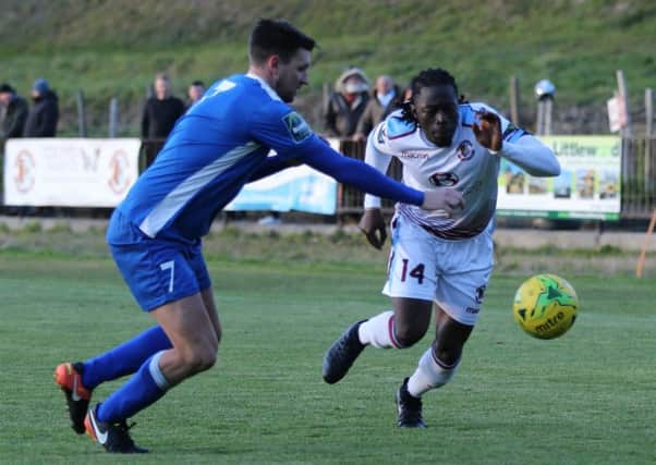 Two-goal Youssouf Bamba tries to take on an opponent during Hastings United's 2-1 win at home to Three Bridges. Picture courtesy Scott White