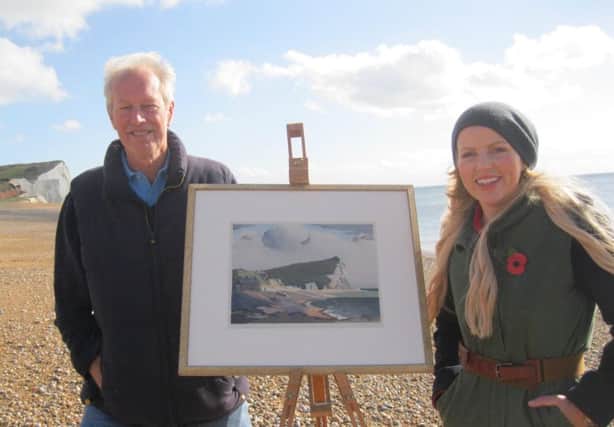 Seeing double ... author James Trollope with Countryfile's Ellie Harrison and Eric Slater's image of Seaford Head