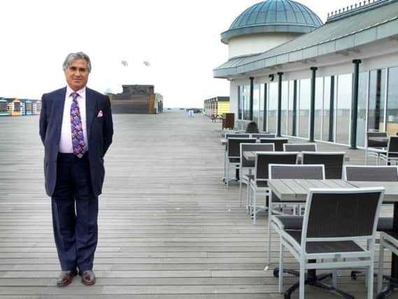 Sheikh Abid Gulzar pictured on Hastings Pier. Photo by Sid Saunders SUS-180619-145632001