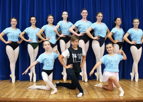 Young dancers from the Horsham district who are set to take part in English Youth Ballet's (EYB) new producation called 'Cinderella in Hollywood'. Back line - Aimee Johnston, Georgia Rixson, Emily McGivern, Amelia Newman, Abigail Mellor, Amy Griffiths, Summer Avedissian, Charlotte Coleman. Front line - Ruby Fraser, Kye Hill, Laila Cronin. Picture by Ben Garner SUS-180511-155927001