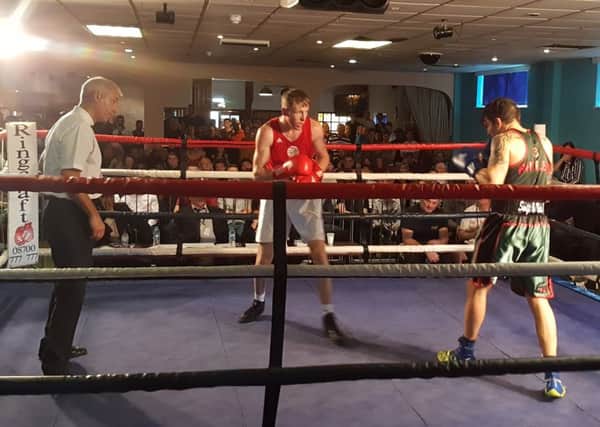 Randall Barlow and Ben Hall in action at the Crawley Boxing Club show at Goffs Park Social Club. SUS-180511-161711002