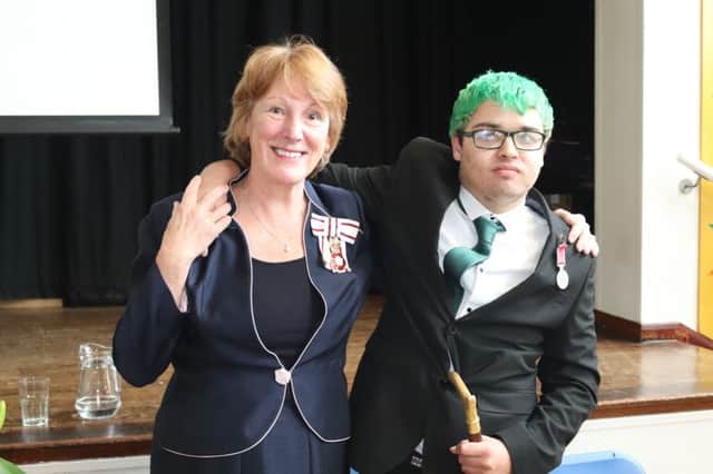Tyler Murphy with the Lord Lieutenant of West Sussex, Susan Pyper, who presented him with the British Empire Medal on behalf of Her Majesty the Queen.