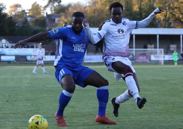 Emmanuel Mensah tussles for possession during Hastings United's 2-1 league win at home to Three Bridges on Saturday. Picture courtesy Scott White