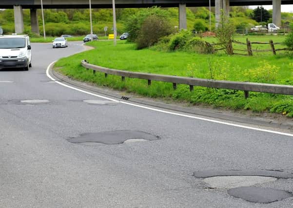 filled-in potholes along the A283 close to the Shoreham Flyover. Pic Steve Robards SR1811072 SUS-180423-163320001