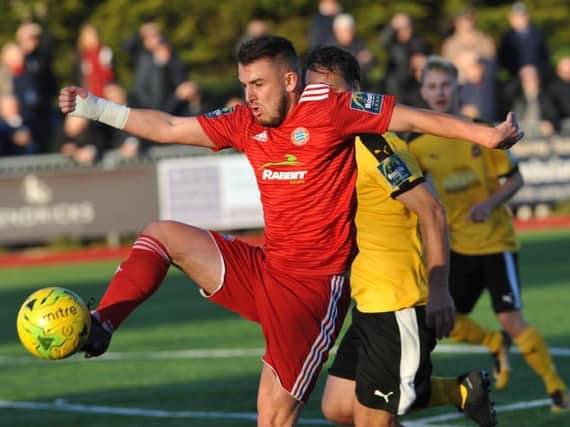 Reece Meekums in action for Worthing against Folkestone on Saturday. Picture by Stephen Goodger
