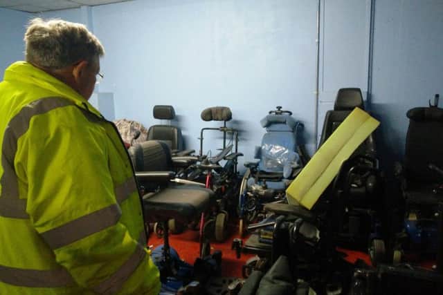 Martin Osment uses parts from unused powerchairs to build new ones at Freedom Powerchairs