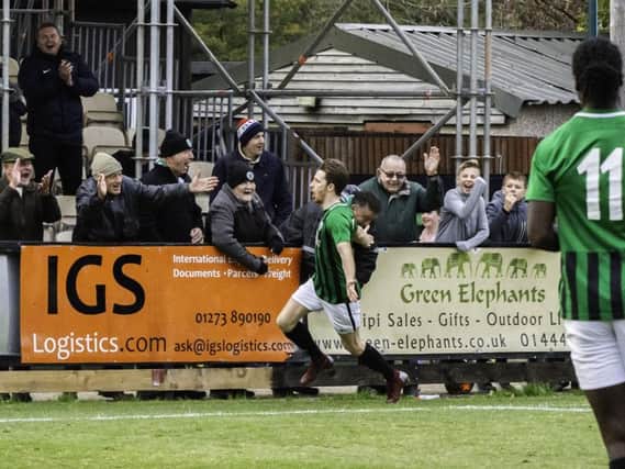 Kieron Pamment celebrates his final goal for Burgess Hill Town in their 1-1 FA Trophy draw against Worthing. The forward has since moved on to fellow Bostik Premier side Lewes. Picture by Chris Neal.
