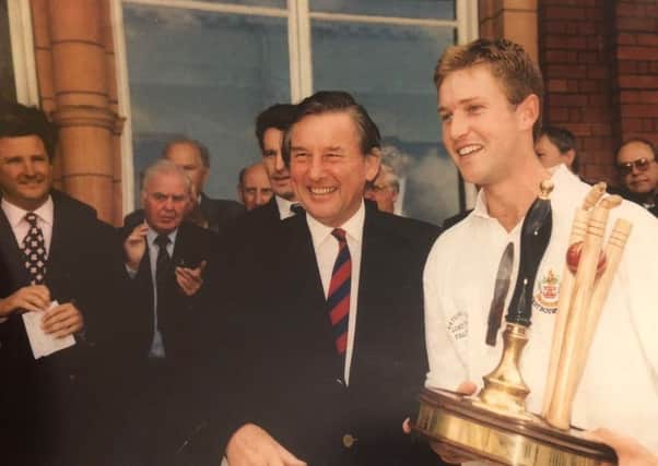 Alex Halliday receives the trophy at Lord's