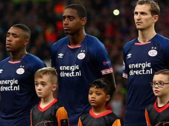 Theo Cook (front left) lining up with Dutch midfielder Pablo Rosario (back middle). Getty Images
