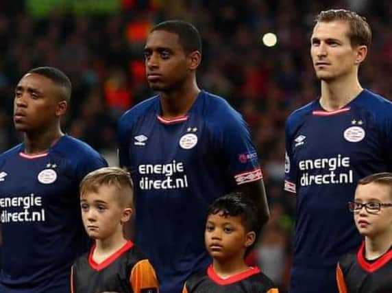 Theo Cook (front left) lining up with Dutch midfielder Pablo Rosario (back middle). Getty Images