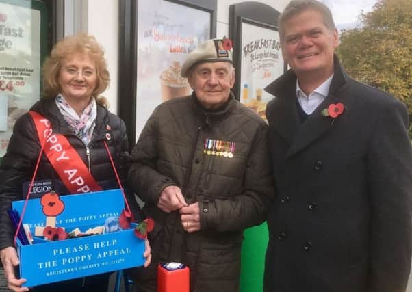 Stephen Lloyd MP with Poppy Appeal collector George Thornton, and Georges daughter, Val SUS-180811-102904001