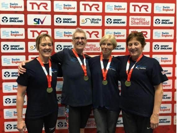On the podium, the new British and European record holders receiving their medals for the Ladies 4x100m Medley relay. From left to right; Jill Rocky, Sally Mills, Judith McKerchar and Kathy Bidnall. Picture courtesy of Lisa Mills.