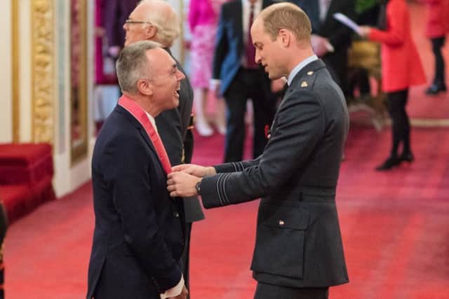 Ryan Campbell is presented with a CBE by His Royal Highness Prince William of Wales SUS-181113-140939001