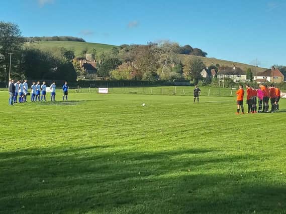 A minute's silence is observed by East Dean and Sompting