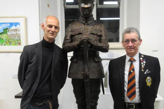 Vincent Gray (left) with his sculpture of local WW1 soldier Maurice Patten, pictured with Dave Tilley of the Royal Sussex Regiment Association. Picture contributed