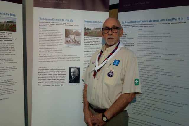 Explorer Scout leader Bob Rendall from 1st Arundel Scout Group and Centurion Explorer Scouts, with the panels about the Scouts' contribution