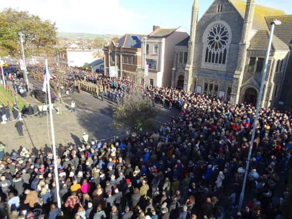 Crowds gather outside Worthing Town Hall. Credit Eddie Mitchell