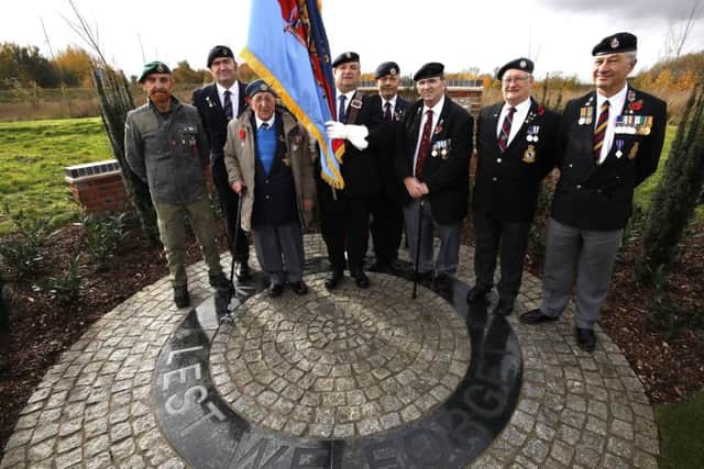 Stanley Northeast and members of the Littlehampton Armed Forces and Veterans Breakfast Club SUS-181211-132000001