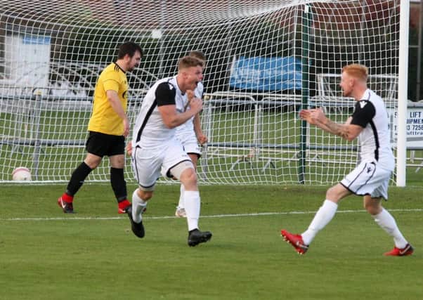 Lewis McGuigan celebrates with Wayne Giles after scoring Bexhill United's winner away to Littlehampton Town. Pictures courtesy Derek Martin Photography